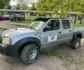 Сірий Ніссан Навара, об'ємом двигуна 2.5 л та пробігом 170 тис. км за 4099 $, фото 1 на Automoto.ua