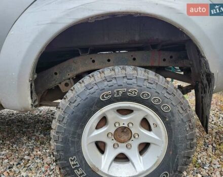 Серый Ниссан Навара, объемом двигателя 2.7 л и пробегом 240 тыс. км за 7999 $, фото 3 на Automoto.ua