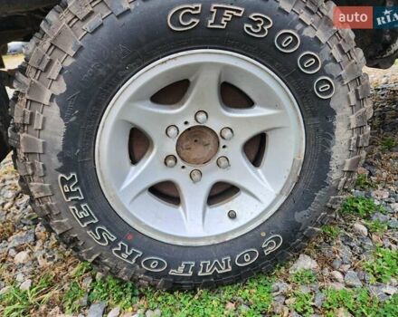 Серый Ниссан Навара, объемом двигателя 2.7 л и пробегом 240 тыс. км за 7999 $, фото 26 на Automoto.ua