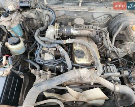 Серый Ниссан Навара, объемом двигателя 2.7 л и пробегом 240 тыс. км за 7999 $, фото 28 на Automoto.ua