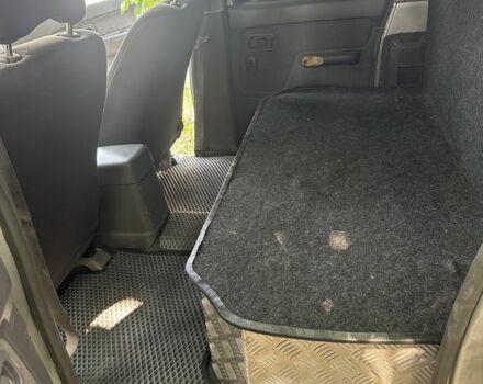 Серый Ниссан Навара, объемом двигателя 2.5 л и пробегом 375 тыс. км за 4842 $, фото 5 на Automoto.ua