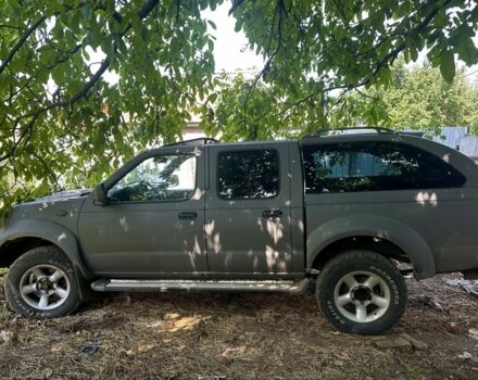 Серый Ниссан Навара, объемом двигателя 2.5 л и пробегом 375 тыс. км за 4842 $, фото 1 на Automoto.ua