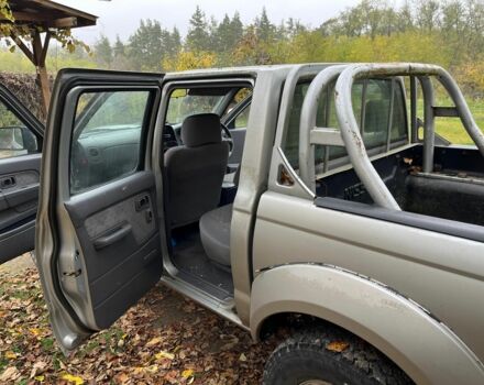 Сірий Ніссан Навара, об'ємом двигуна 2.5 л та пробігом 133 тис. км за 5600 $, фото 5 на Automoto.ua