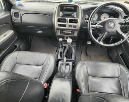 Серый Ниссан Навара, объемом двигателя 2.5 л и пробегом 149 тыс. км за 7203 $, фото 22 на Automoto.ua