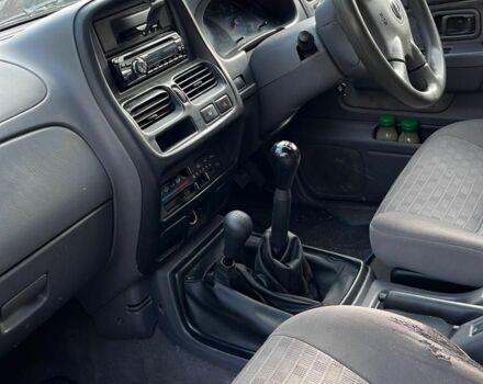 Сірий Ніссан Навара, об'ємом двигуна 2.5 л та пробігом 133 тис. км за 5600 $, фото 1 на Automoto.ua