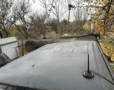 Серый Ниссан Навара, объемом двигателя 2.5 л и пробегом 197 тыс. км за 5100 $, фото 7 на Automoto.ua