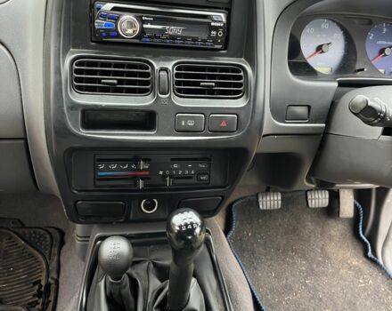 Сірий Ніссан Навара, об'ємом двигуна 2.5 л та пробігом 133 тис. км за 5600 $, фото 4 на Automoto.ua