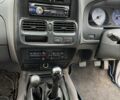 Сірий Ніссан Навара, об'ємом двигуна 2.5 л та пробігом 133 тис. км за 5600 $, фото 4 на Automoto.ua