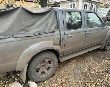 Серый Ниссан Навара, объемом двигателя 2.5 л и пробегом 197 тыс. км за 5100 $, фото 4 на Automoto.ua