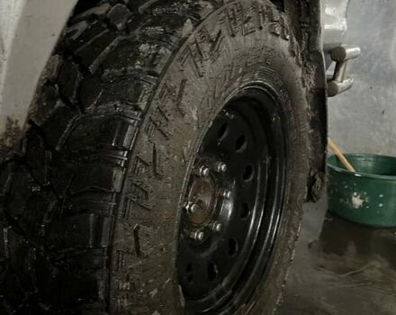 Серый Ниссан Навара, объемом двигателя 2.5 л и пробегом 171 тыс. км за 5937 $, фото 4 на Automoto.ua