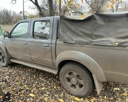 Серый Ниссан Навара, объемом двигателя 2.5 л и пробегом 197 тыс. км за 5100 $, фото 3 на Automoto.ua