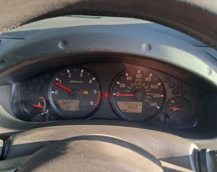 Серый Ниссан Навара, объемом двигателя 2.5 л и пробегом 240 тыс. км за 6000 $, фото 4 на Automoto.ua