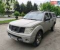 Серый Ниссан Навара, объемом двигателя 2.5 л и пробегом 327 тыс. км за 12000 $, фото 1 на Automoto.ua