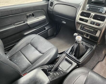 Серый Ниссан Навара, объемом двигателя 2.5 л и пробегом 149 тыс. км за 7203 $, фото 15 на Automoto.ua