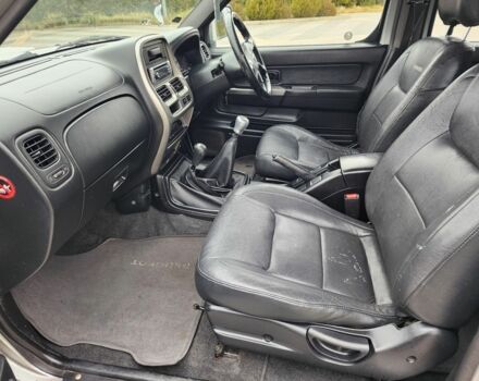 Серый Ниссан Навара, объемом двигателя 2.5 л и пробегом 149 тыс. км за 7203 $, фото 18 на Automoto.ua