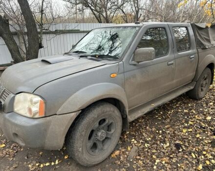 Серый Ниссан Навара, объемом двигателя 2.5 л и пробегом 197 тыс. км за 5100 $, фото 2 на Automoto.ua