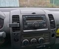 Серый Ниссан Навара, объемом двигателя 2.49 л и пробегом 240 тыс. км за 9500 $, фото 1 на Automoto.ua