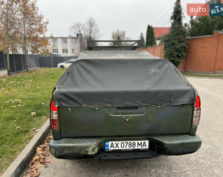Серый Ниссан Навара, объемом двигателя 2.49 л и пробегом 340 тыс. км за 8500 $, фото 4 на Automoto.ua