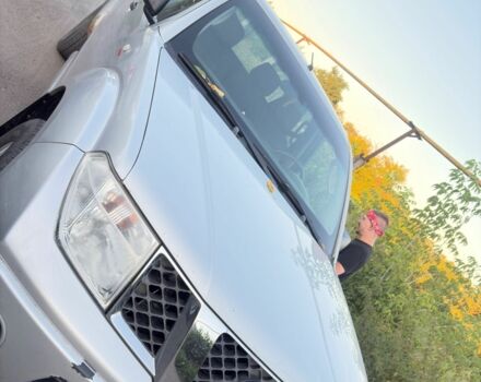 Серый Ниссан Навара, объемом двигателя 2.5 л и пробегом 316 тыс. км за 5216 $, фото 3 на Automoto.ua