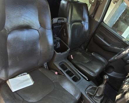 Серый Ниссан Навара, объемом двигателя 2.5 л и пробегом 466 тыс. км за 3400 $, фото 4 на Automoto.ua