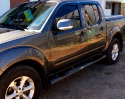 Серый Ниссан Навара, объемом двигателя 2.5 л и пробегом 204 тыс. км за 13500 $, фото 3 на Automoto.ua