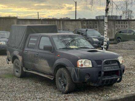 Серый Ниссан Навара, объемом двигателя 2.5 л и пробегом 255 тыс. км за 2700 $, фото 1 на Automoto.ua