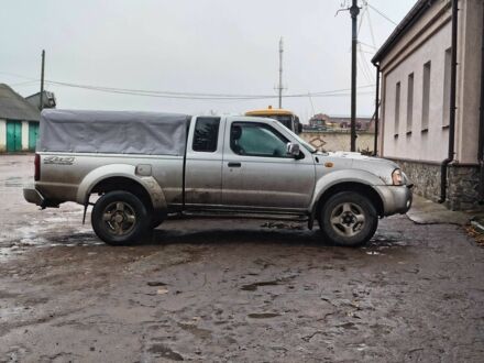 Серый Ниссан Навара, объемом двигателя 2.5 л и пробегом 305 тыс. км за 6154 $, фото 1 на Automoto.ua