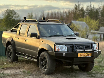 Ниссан Навара 2005 в Запорожье на Automoto.ua Серый Ниссан Навара, объемом двигателя 2.5 л и пробегом 260 тыс. км за 6500 $, фото 1 на Automoto.ua