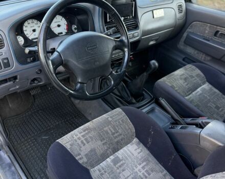 Синий Ниссан Навара, объемом двигателя 2.5 л и пробегом 250 тыс. км за 4200 $, фото 4 на Automoto.ua