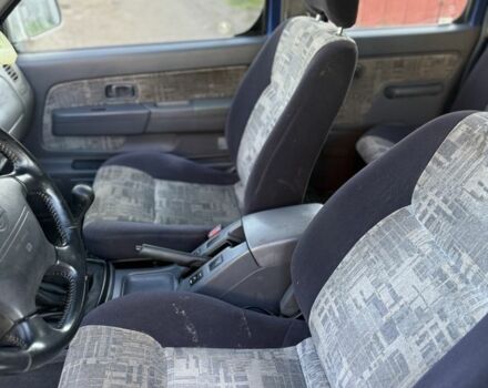 Синий Ниссан Навара, объемом двигателя 2.5 л и пробегом 250 тыс. км за 4200 $, фото 5 на Automoto.ua