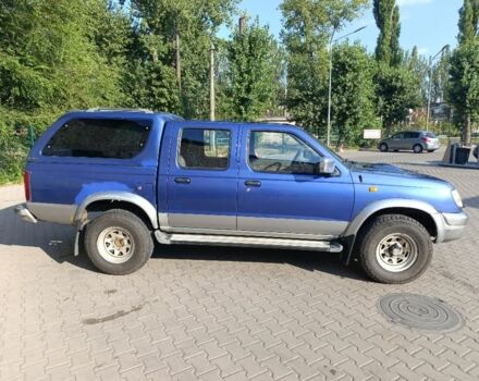 Синий Ниссан Навара, объемом двигателя 2.5 л и пробегом 388 тыс. км за 4500 $, фото 2 на Automoto.ua