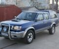 Синий Ниссан Навара, объемом двигателя 2.5 л и пробегом 250 тыс. км за 4200 $, фото 1 на Automoto.ua