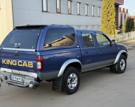 Синий Ниссан Навара, объемом двигателя 2.5 л и пробегом 250 тыс. км за 4200 $, фото 2 на Automoto.ua