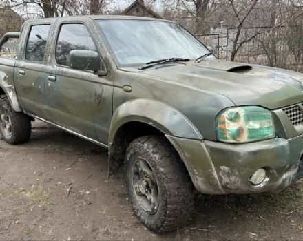 Синий Ниссан Навара, объемом двигателя 2.5 л и пробегом 281 тыс. км за 4000 $, фото 1 на Automoto.ua