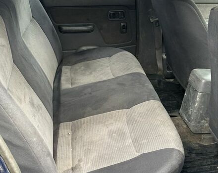 Синий Ниссан Навара, объемом двигателя 2.5 л и пробегом 281 тыс. км за 4000 $, фото 5 на Automoto.ua