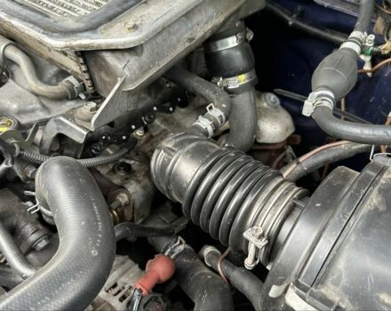 Синий Ниссан Навара, объемом двигателя 2.5 л и пробегом 281 тыс. км за 4000 $, фото 9 на Automoto.ua