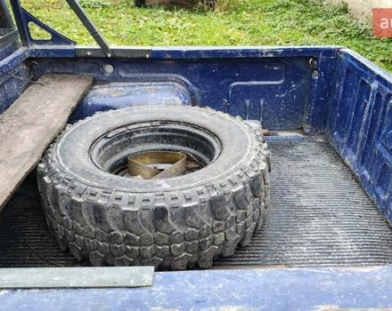 Синій Ніссан Навара, об'ємом двигуна 2.5 л та пробігом 316 тис. км за 7246 $, фото 7 на Automoto.ua