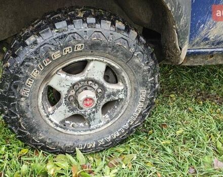 Синій Ніссан Навара, об'ємом двигуна 2.5 л та пробігом 316 тис. км за 7246 $, фото 8 на Automoto.ua