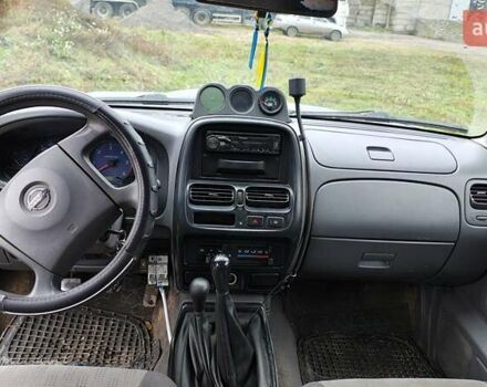 Синій Ніссан Навара, об'ємом двигуна 2.5 л та пробігом 316 тис. км за 7246 $, фото 10 на Automoto.ua