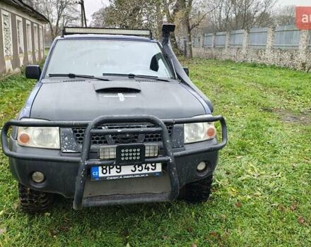 Синій Ніссан Навара, об'ємом двигуна 2.5 л та пробігом 316 тис. км за 7246 $, фото 4 на Automoto.ua