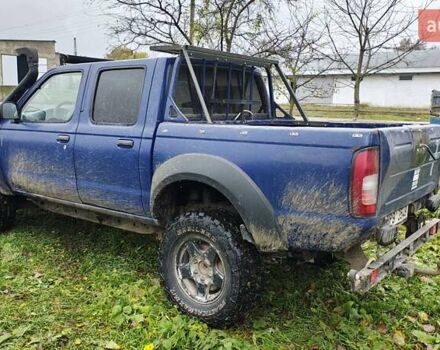 Синій Ніссан Навара, об'ємом двигуна 2.5 л та пробігом 316 тис. км за 7246 $, фото 2 на Automoto.ua