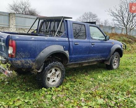 Синій Ніссан Навара, об'ємом двигуна 2.5 л та пробігом 316 тис. км за 7246 $, фото 3 на Automoto.ua