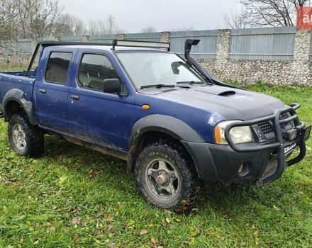 Синій Ніссан Навара, об'ємом двигуна 2.5 л та пробігом 316 тис. км за 7246 $, фото 1 на Automoto.ua