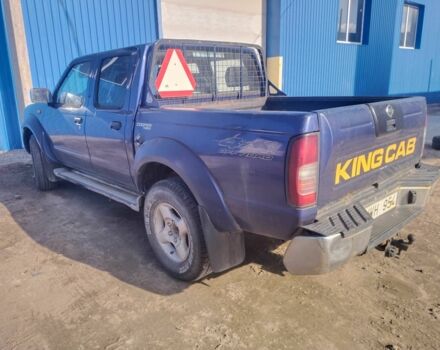 Синий Ниссан Навара, объемом двигателя 2.5 л и пробегом 250 тыс. км за 5213 $, фото 3 на Automoto.ua