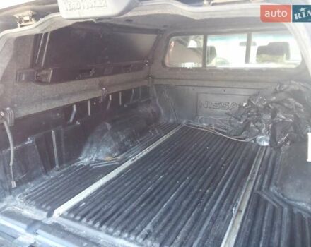 Синий Ниссан Навара, объемом двигателя 2.49 л и пробегом 369 тыс. км за 11900 $, фото 1 на Automoto.ua