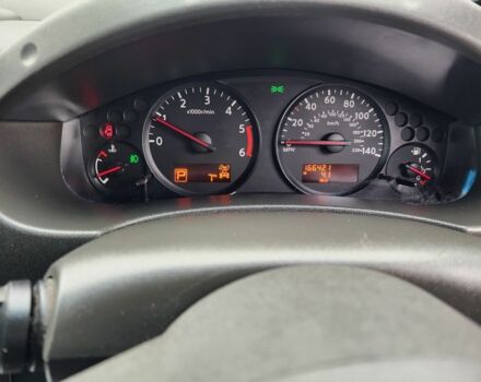 Синій Ніссан Навара, об'ємом двигуна 2.5 л та пробігом 166 тис. км за 7628 $, фото 15 на Automoto.ua