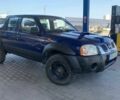 Синий Ниссан Навара, объемом двигателя 2.5 л и пробегом 270 тыс. км за 2764 $, фото 2 на Automoto.ua