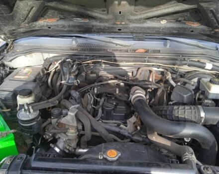 Синий Ниссан Навара, объемом двигателя 2.5 л и пробегом 350 тыс. км за 5500 $, фото 4 на Automoto.ua