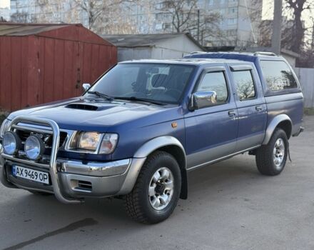 Синій Ніссан Навара, об'ємом двигуна 2.5 л та пробігом 250 тис. км за 4200 $, фото 1 на Automoto.ua