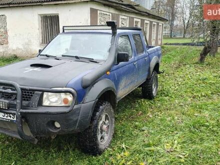 Синий Ниссан Навара, объемом двигателя 2.5 л и пробегом 316 тыс. км за 7246 $, фото 1 на Automoto.ua